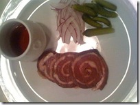 Rolled pig's spleen with bacon